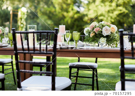 Georgeous wedding table decorated with flowers 70157295