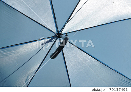 Striped umbrella background view from below 70157491