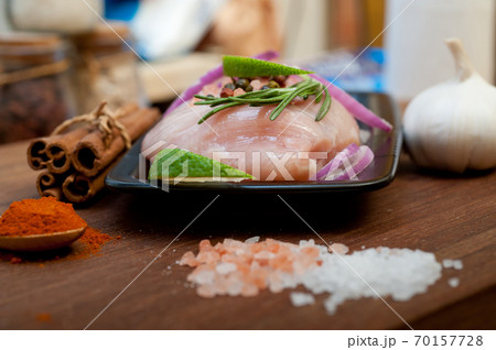 fresh organic chicken breast with herbs and spices 70157728