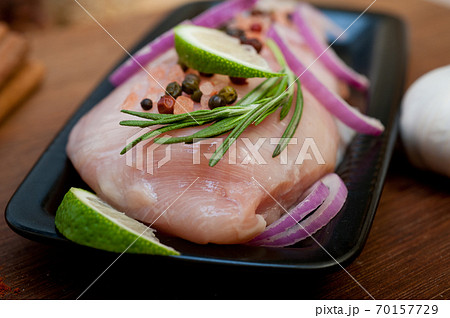 fresh organic chicken breast with herbs and spices fresh organic chicken breast with herbs and spices 70157729