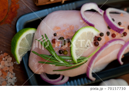 fresh organic chicken breast with herbs and spices 70157730