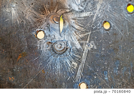 Bullet holes on on armored steel Bullet holes on on armored steel 70160840