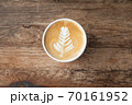 Topviews of a Late coffee cup on old wooden table background 70161952