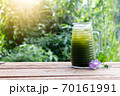 Centella asiatica iced drink water on wooden table, Healthy drink 70161991