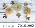 Autumn and Thanksgiving day  background from fallen leaves and pumpkins fruits on wooden table 70161992