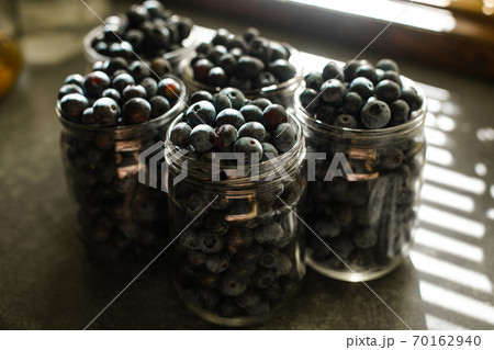 Blueberries in glass jars for conservation Blueberries in glass jars for conservation 70162940