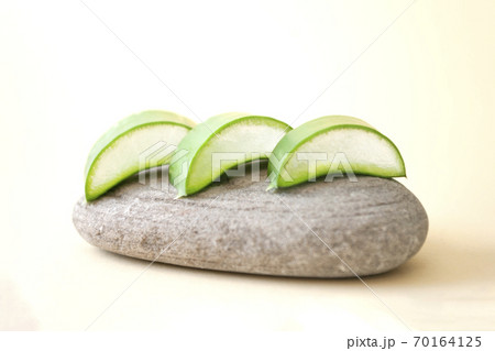 Aloe vera fresh slices on the grey stone 70164125