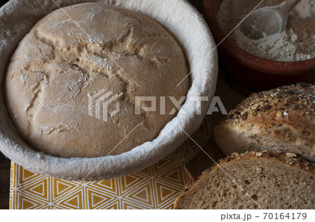 sourdough dough in proofing basket ,before baking, whole wheat recipe. Rye flour. Home made seed bread. sourdough dough in proofing basket ,before baking, whole wheat recipe. Rye flour. Home made seed bread. 70164179