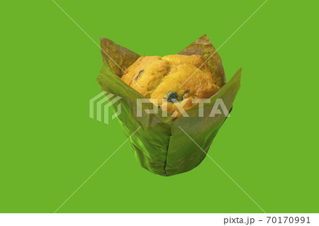 muffin on a green background close-up. isolate 70170991