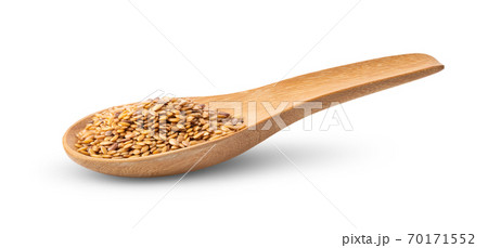 flax seeds in wood spoon isolated on white flax seeds in wood spoon isolated on white 70171552