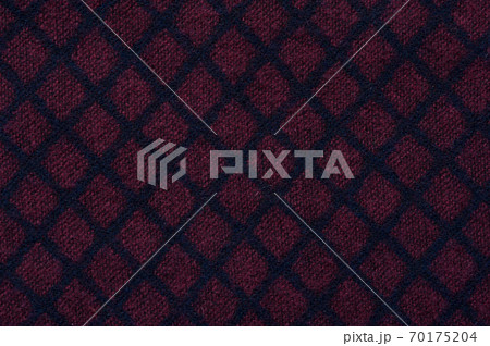 Close-up fragment of warm knitted printed sweatshirts. Concept of warm everyday things. clothing store concept. Advertising space. Place for text 70175204