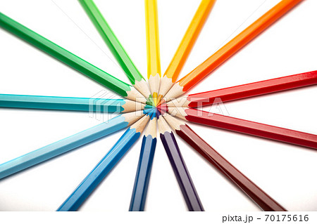 A lot of colorful wooden pencils on a white background 70175616
