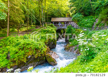 Entrance Bridge to Sigmund Thun Gorge. Cascade valley of wild Kapruner Ache near Kaprun, Austria Entrance Bridge to Sigmund Thun Gorge. Cascade valley of wild Kapruner Ache near Kaprun, Austria 70182129