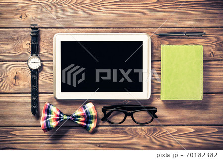 Hipster set on wooden table Hipster set on wooden table 70182382