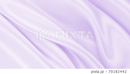 Smooth elegant lilac silk or satin texture as wedding background. Luxurious background design Smooth elegant lilac silk or satin texture as wedding background. Luxurious background design 70182442