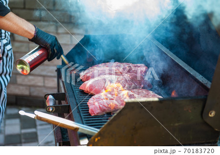 Pork meat steaks on the grill Pork meat steaks on the grill 70183720