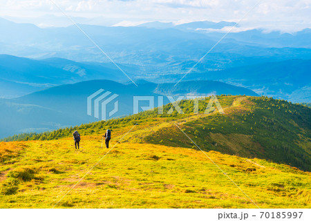 People travelling in mountains People travelling in mountains 70185997