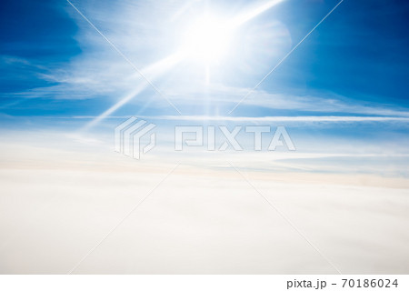 Cloudscape view with bright sun Cloudscape view with bright sun 70186024
