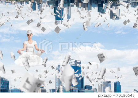 Young woman keeping mind conscious. Young woman keeping mind conscious. 70186545