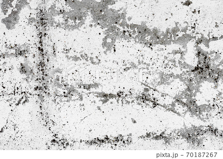 Texture of a concrete wall with cracks and scratches which can be used as a background 70187267