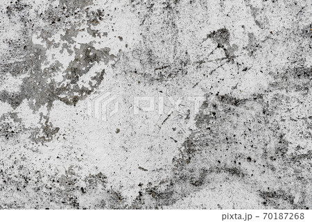 Texture of a concrete wall with cracks and scratches which can be used as a background Texture of a concrete wall with cracks and scratches which can be used as a background 70187268