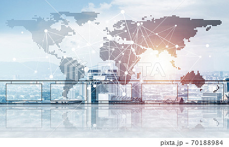 Concept of global communication and networking with world map over cityscape 70188984