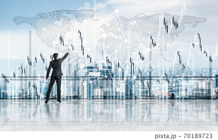 Rear view of businessman drawing social connection and networking concept Rear view of businessman drawing social connection and networking concept 70189723