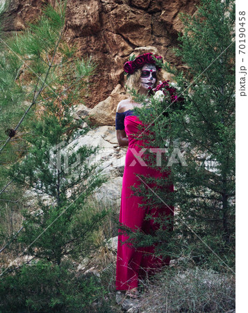 Halloween makeup woman of Santa Muerte outdoors Halloween makeup woman of Santa Muerte outdoors 70190458