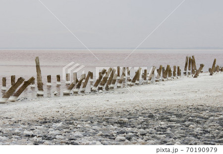pink salt lake - a former place for salt mining. therapeutic diet. wooden beams - the remains of the road for the trolleys on which the salt was transported 70190979
