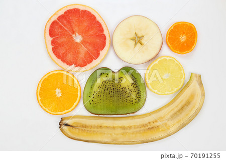thin slicing different fruits on white background 70191255