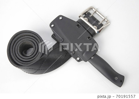 knife for tourism and hunting with a plastic case on a black leather belt on a white background knife for tourism and hunting with a plastic case on a black leather belt on a white background 70191557