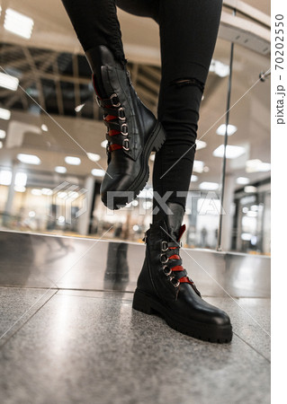 Close up of female legs in black jeans in Close up of female legs in black jeans in 70202550
