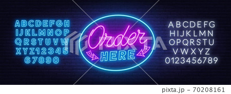 Order here neon sign on brick wall background. 70208161
