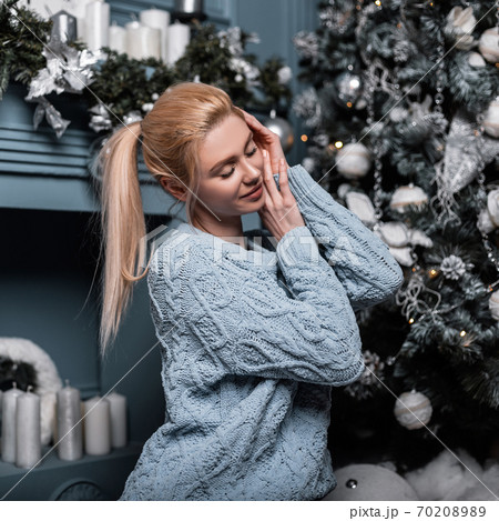 Joyful young glamorous blonde woman in a Joyful young glamorous blonde woman in a 70208989