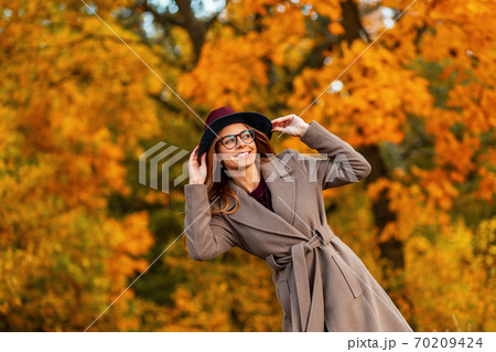 Funny young woman with a beautiful smile with 70209424