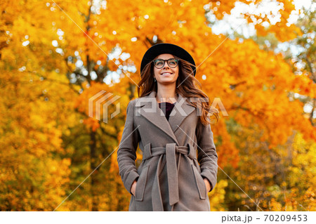Pretty young woman with a positive smile in a Pretty young woman with a positive smile in a 70209453