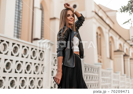 Stylish joyful cute young woman with a cute smile 70209471