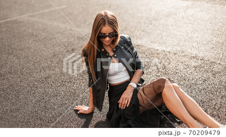 Attractive happy young hipster woman with a Attractive happy young hipster woman with a 70209479