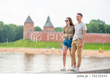 Coulpe at the summer waterfront in Saint Petersburg 70210343