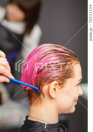 Hair treatment after pink coloring 70211154