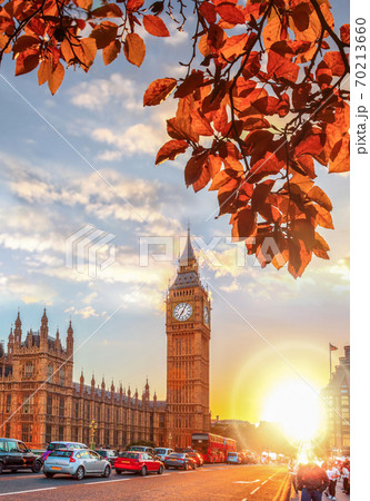 Big Ben against colorful sunset with autumn leaves in London, England 70213660