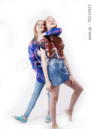 best friends teenage girls together having fun, posing emotional on white background, besties happy smiling, lifestyle people concept best friends teenage girls together having fun, posing emotional on white background, besties happy smiling, lifestyle people concept 70214923