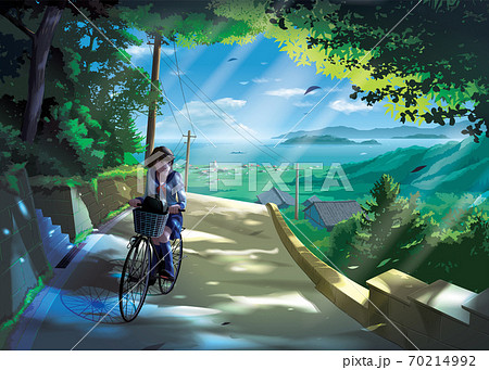 Japanese girl student rides a bicycle on a road in the countryside 70214992