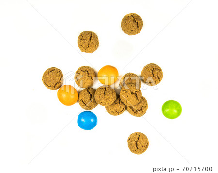 Bunch of scattered pepernoten cookies and sweets 70215700