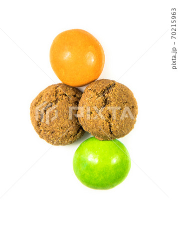 Pepernoten traditional dutch treats on white background Pepernoten traditional dutch treats on white background 70215963