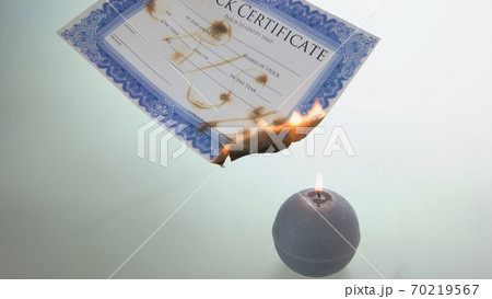 Burning stock certificate. Burning stock certificate. 70219567