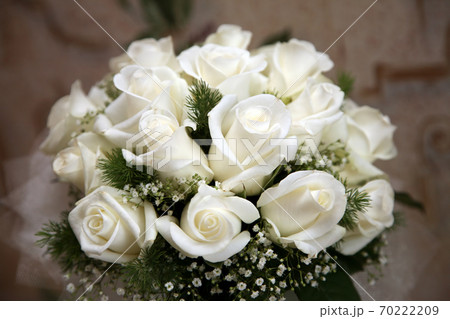 beautiful wedding bouquet of white roses beautiful wedding bouquet of white roses 70222209