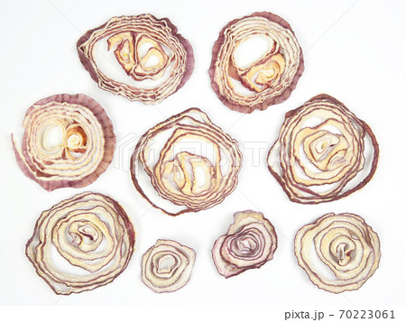 Dried salad onion slices on white background Dried salad onion slices on white background 70223061