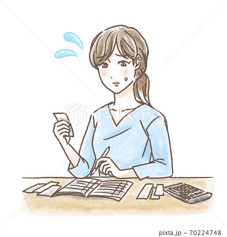 確定申告の帳簿を付ける女性 確定申告の帳簿を付ける女性 70224748