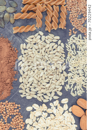 Nutritious eating containing magnesium. Healthy nutrition as source vitamins, minerals and fiber Nutritious eating containing magnesium. Healthy nutrition as source vitamins, minerals and fiber 70229442
